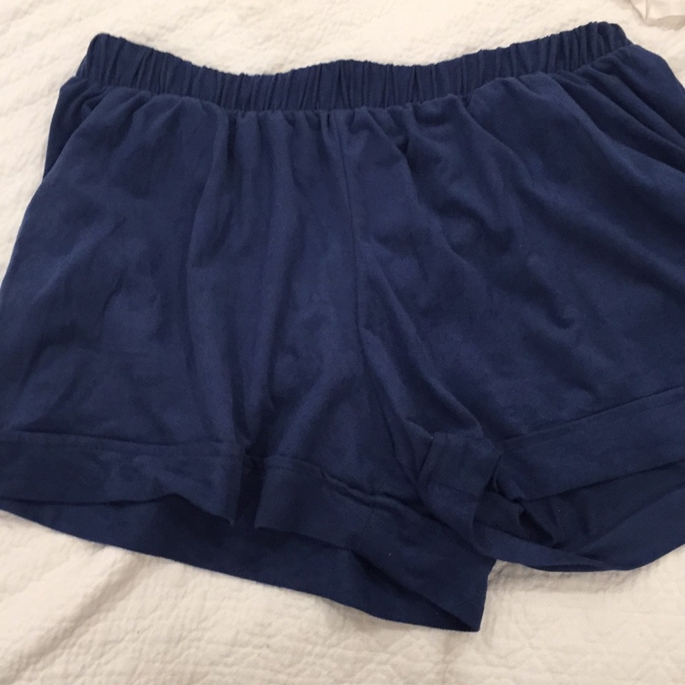 Blue suede shorts with pockets